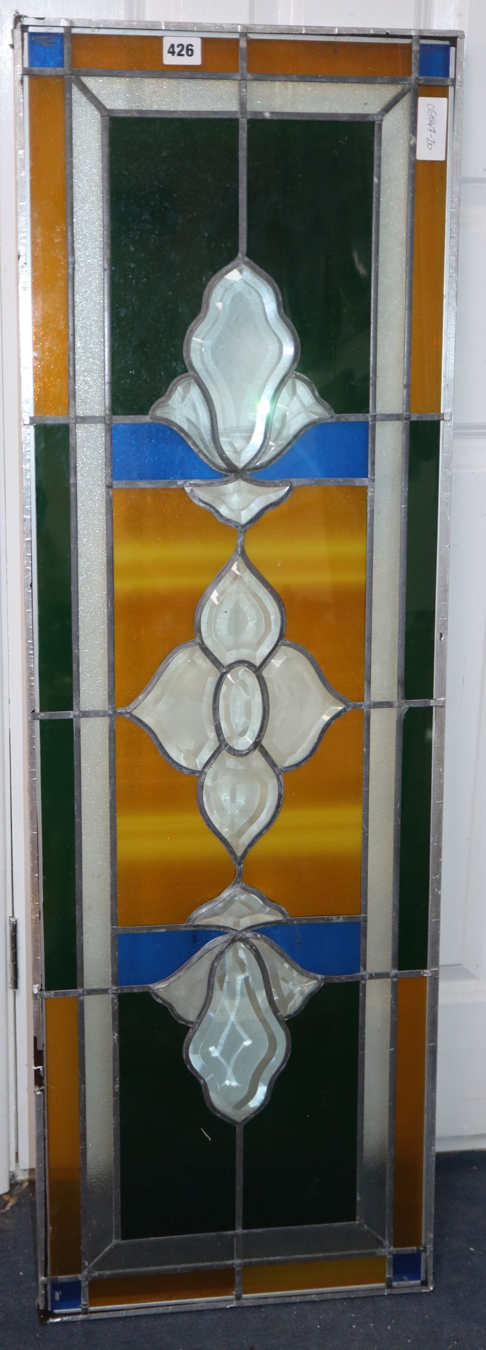 A stained glass panel, 38 x 106cm